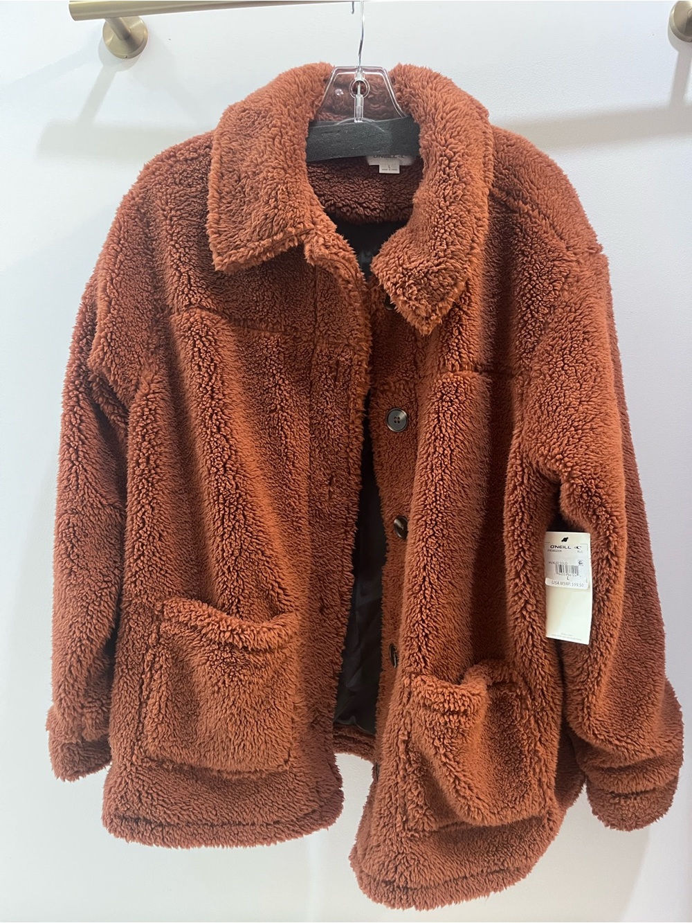 O'Neill Women's Faux Sherpa Jacket in Rust